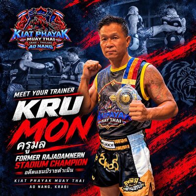 Kru Mon with his championship belt over his shoulder